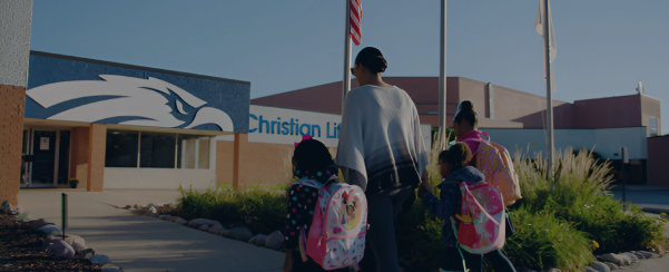 Family Walking in to school