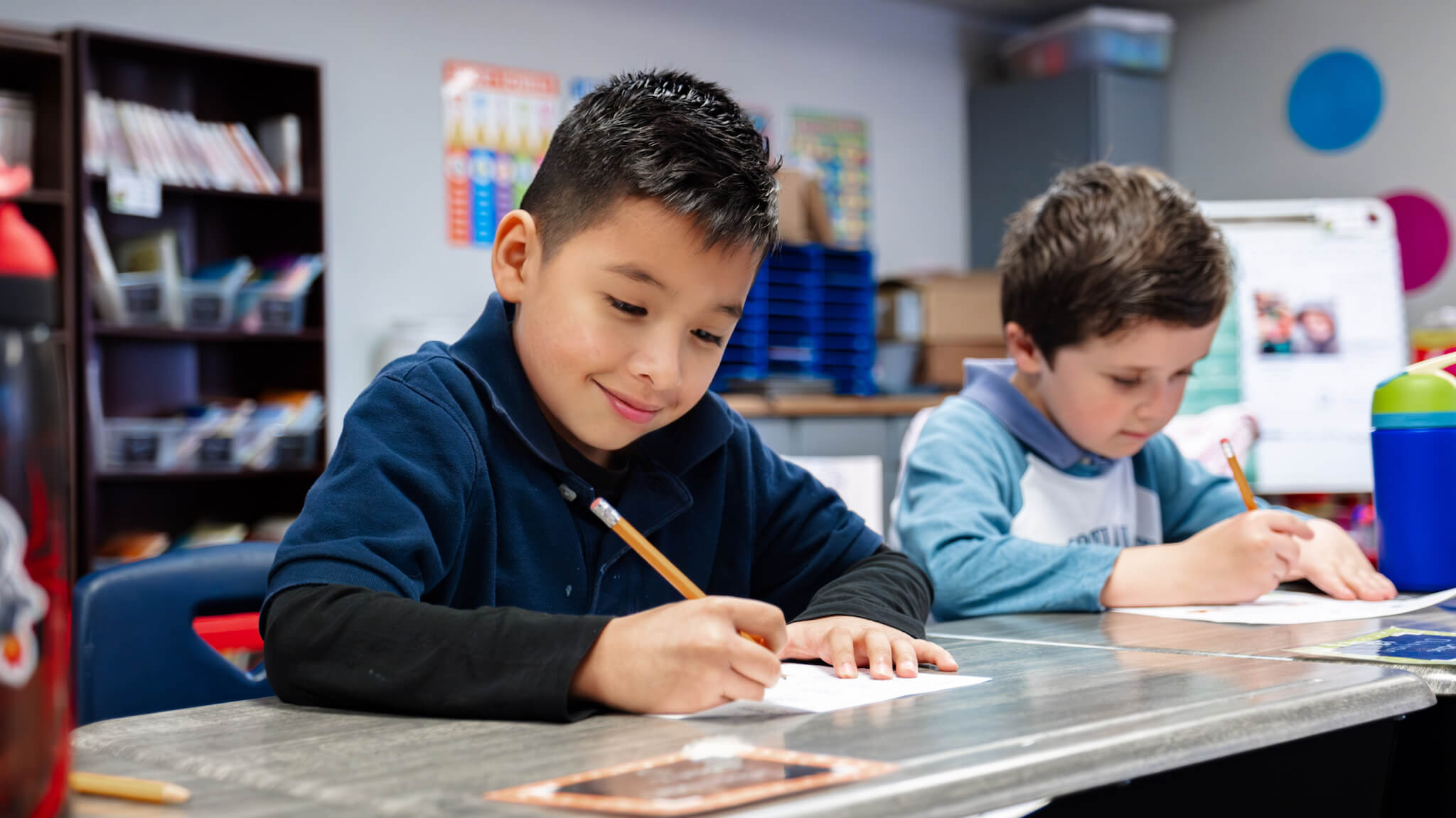 Kids doing schoolwork in class