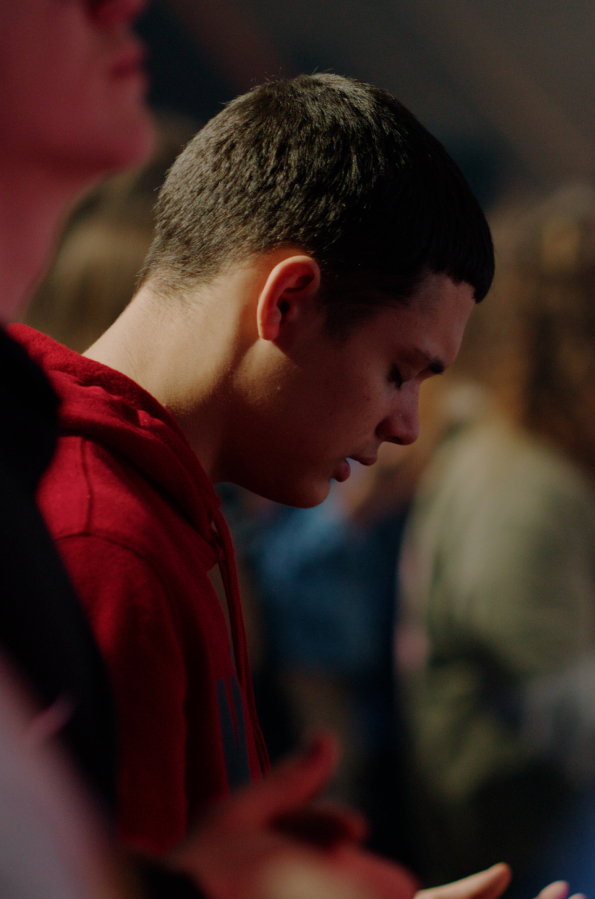 Middle School Students Praying Together