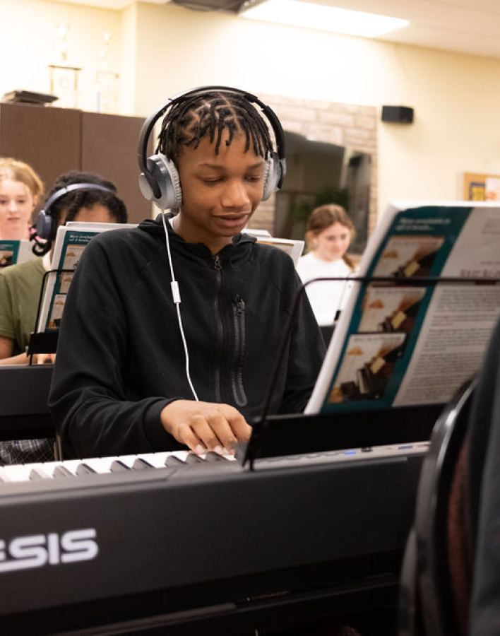 Student in piano class